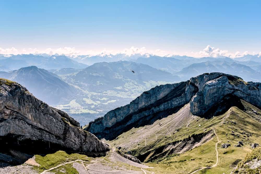 Breathtaking view of Mount Pilatus with winding trails and lush valleys in Switzerland.