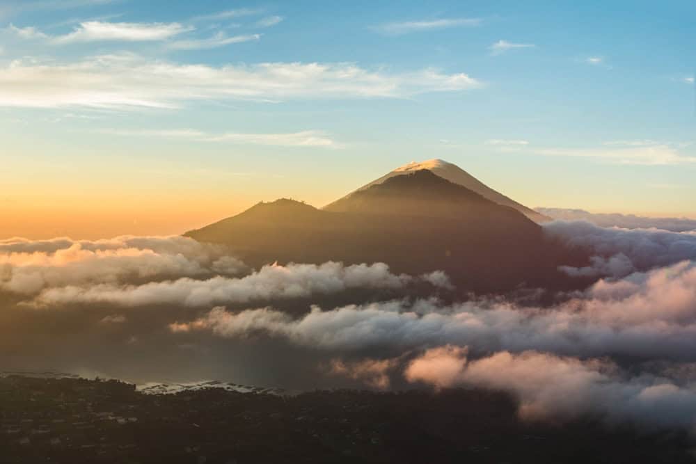 Mount Batur, Indonesia over bed of clouds