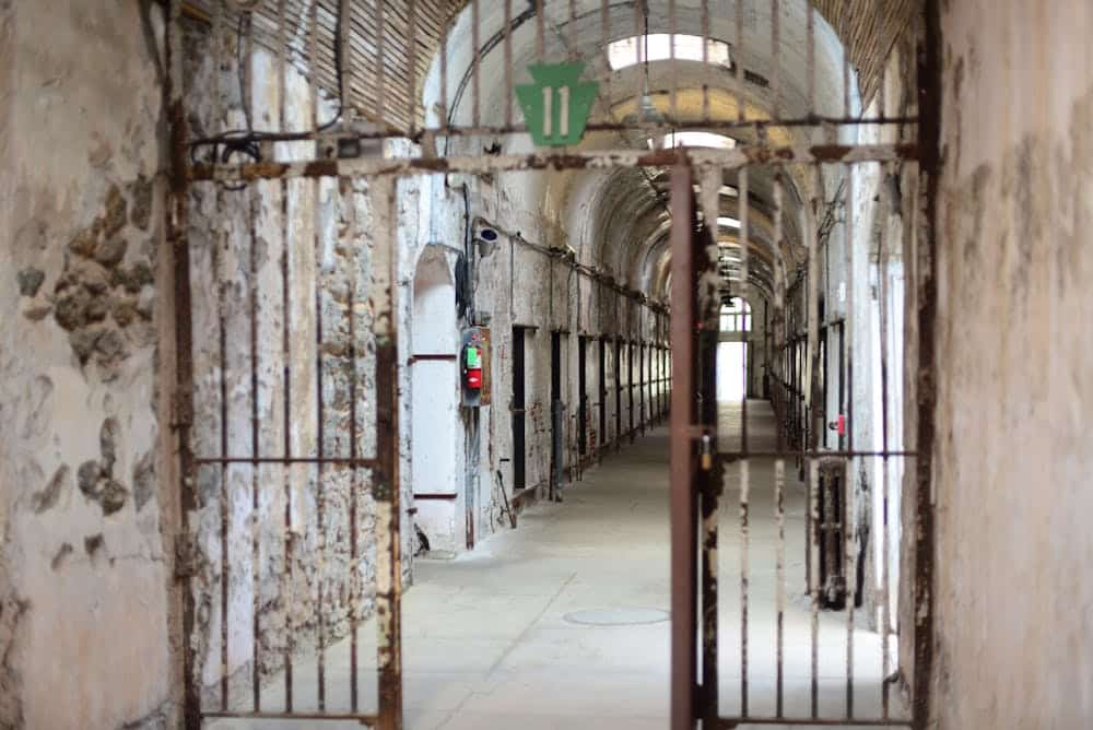 Rustic interior of Eastern State Penitentiary in Philadelphia, showcasing decay.