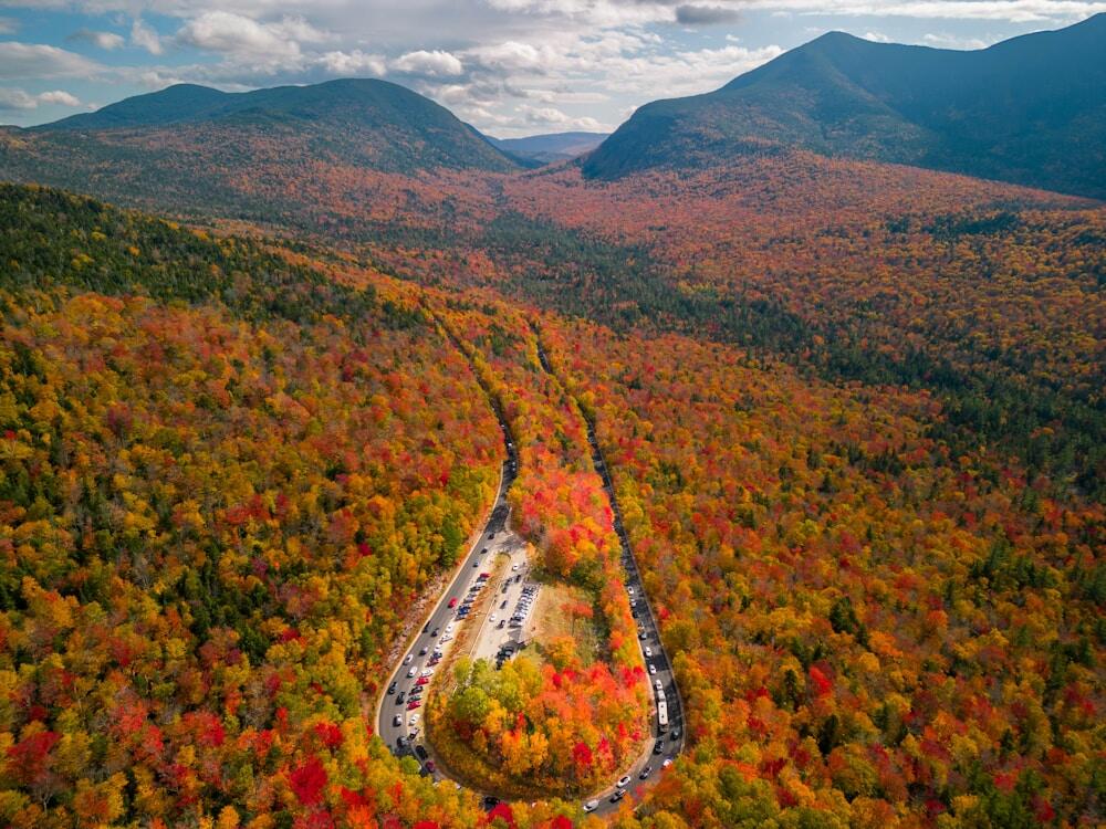 An aerial shot of Kancamagus Highway in New Hampshire on Sunday, Oct. 9, 2022 during peak foliage season.