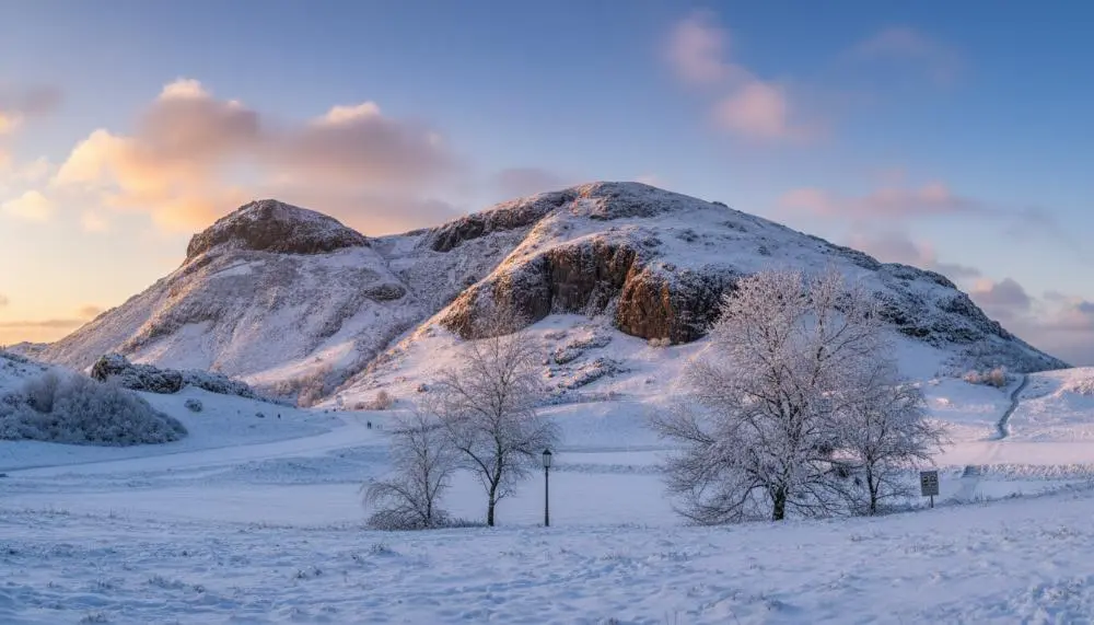 Winter Solstice on sunrise at Arthur's Seat, one of the best hikes to take during December in Europe