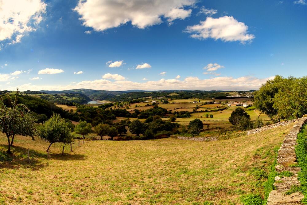 Somewhere on Camino Frances, between Sarria and Santiago de Compostela. If you don't mind walking and love scenic landscapes, you will absolutely love doing Camino de Santiago
