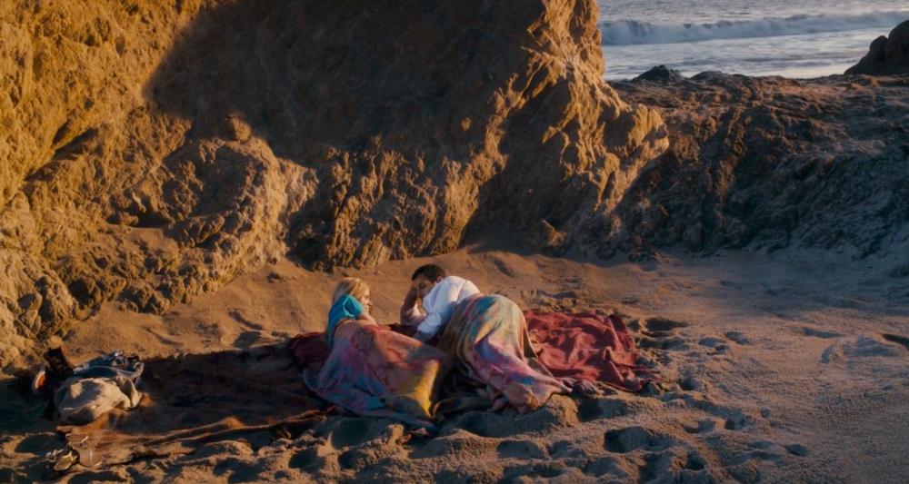 Danny and Palmer wake up on the beach